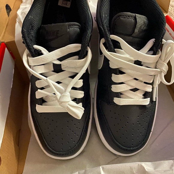 stock x black and white dunks